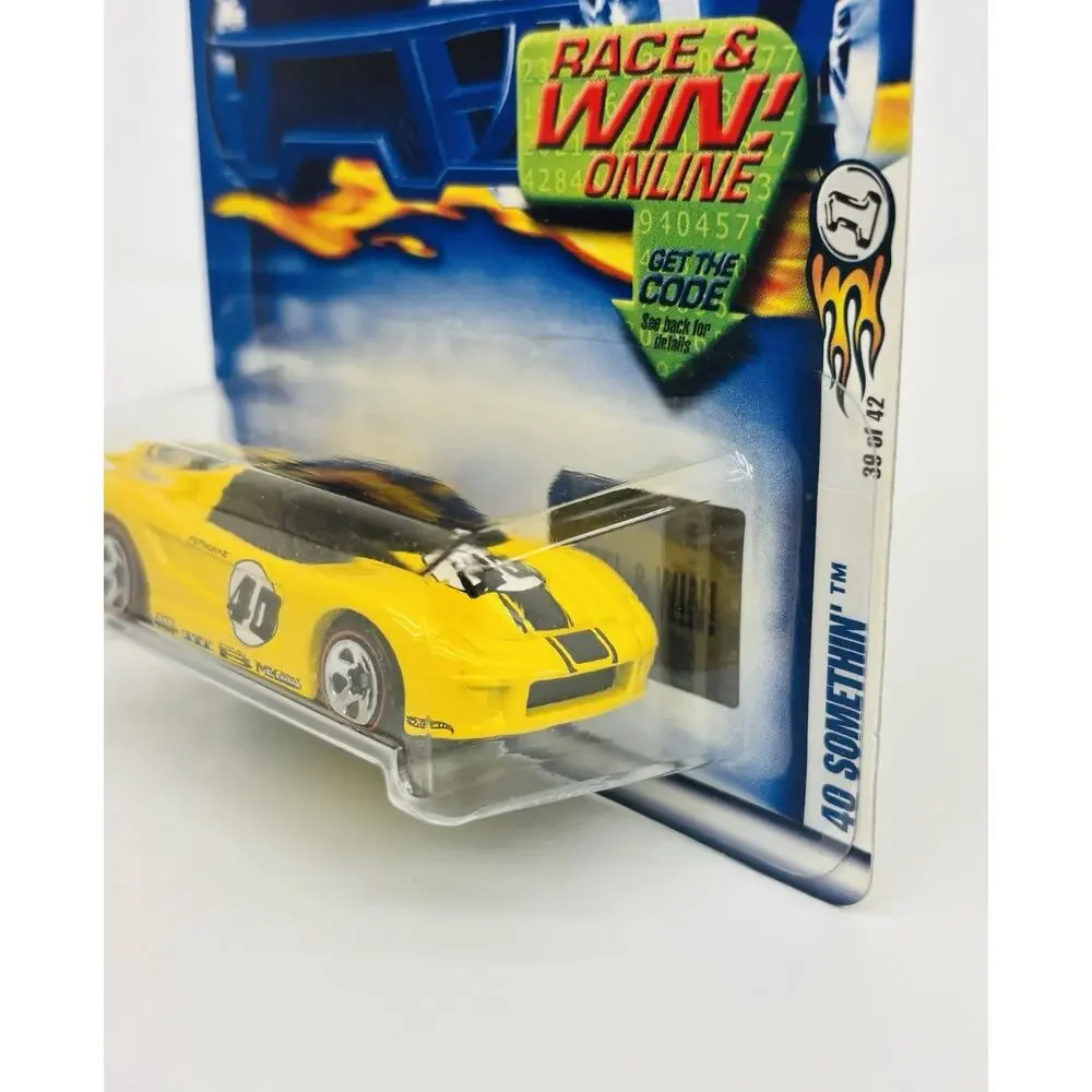 Hot Wheels Velocity X 40 Somethin' Yellow Red Line Wheels 52936 w/ Protector